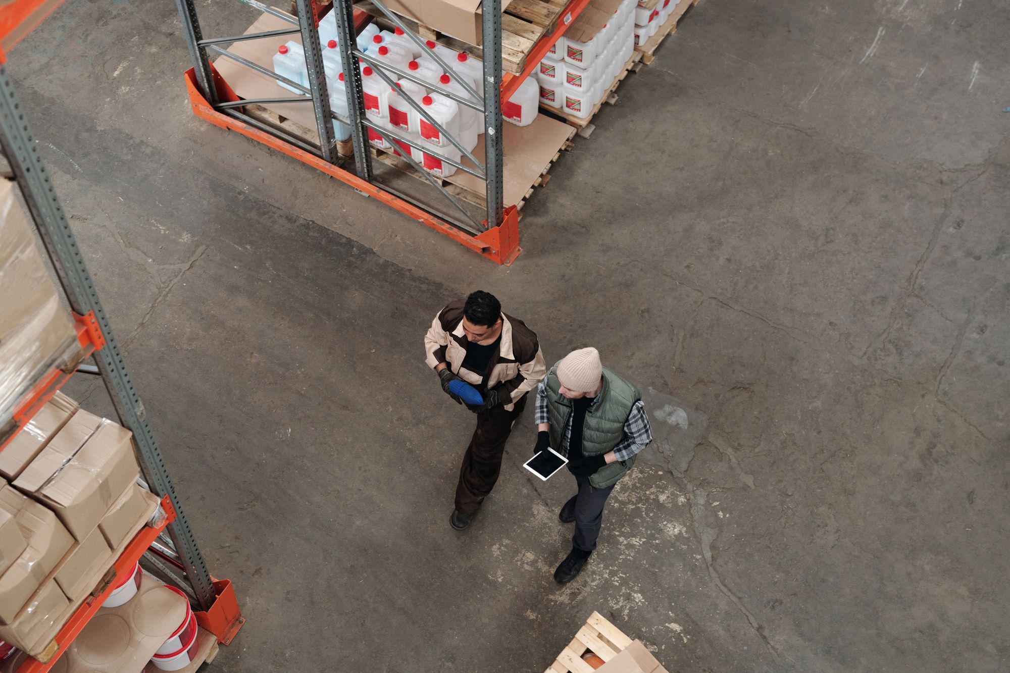 Logistics professionals planning inventory in a warehouse